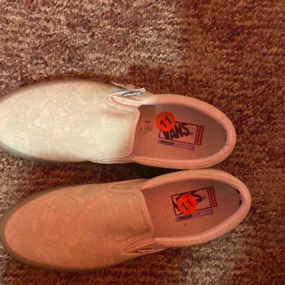 Vans slip on shoes.
